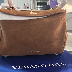 Verano Hill Suede Handbag with Gold Accents
